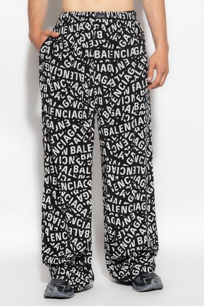 BALENCIAGA High-End Men's Fashion: All-Over Logo Printed Cotton Trousers for FW23